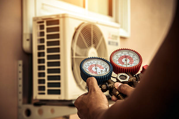 Professional Air Conditioning Service technician working in Ferndale, MD